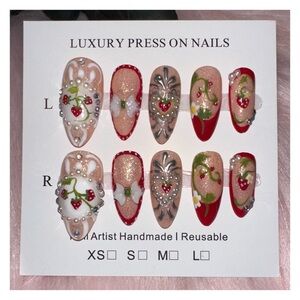 Glamorous Red and silver Strawberry Press-On Nails.